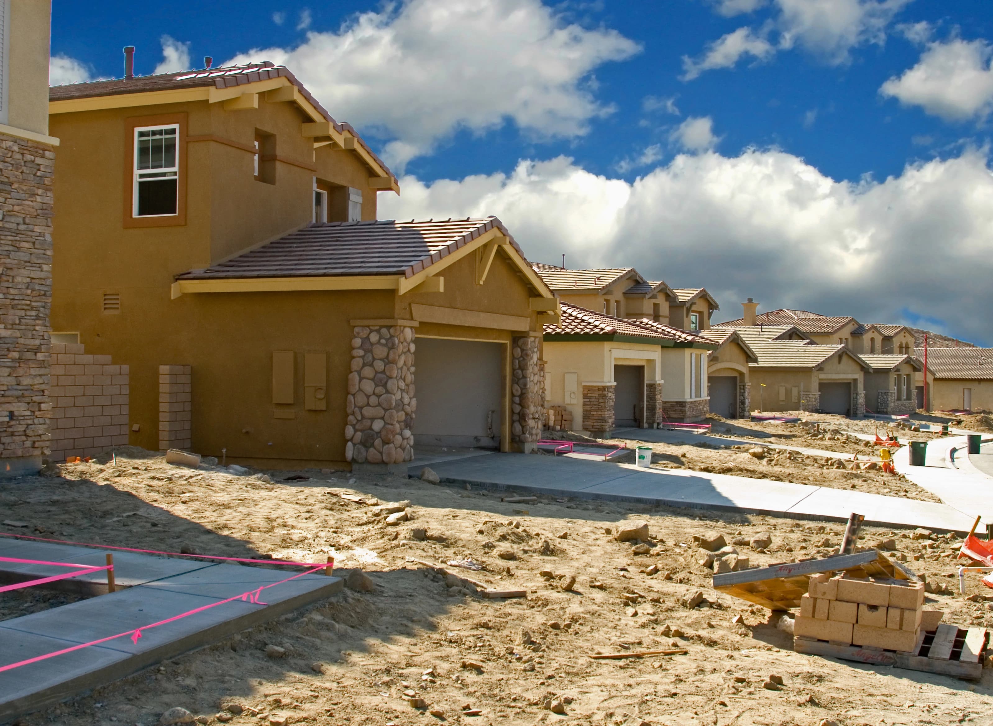 Hero image showing a development of houses being built